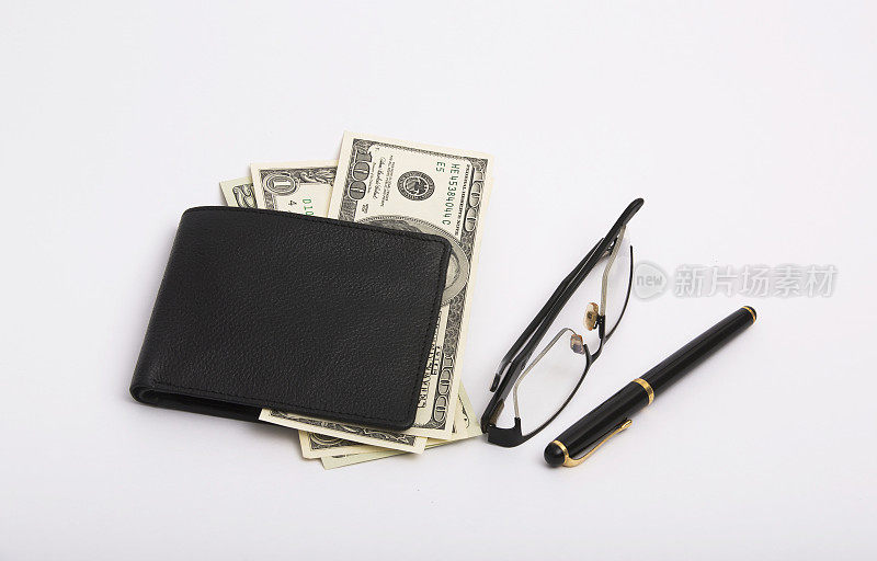 眼镜，钢笔和钱包和钱