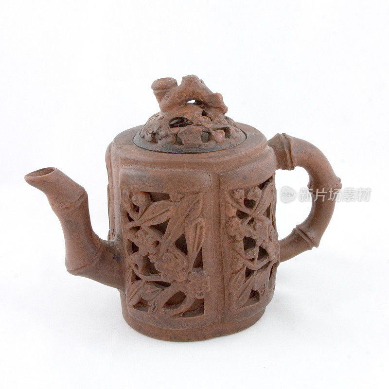 中国宜兴紫砂茶壶:双层雕刻