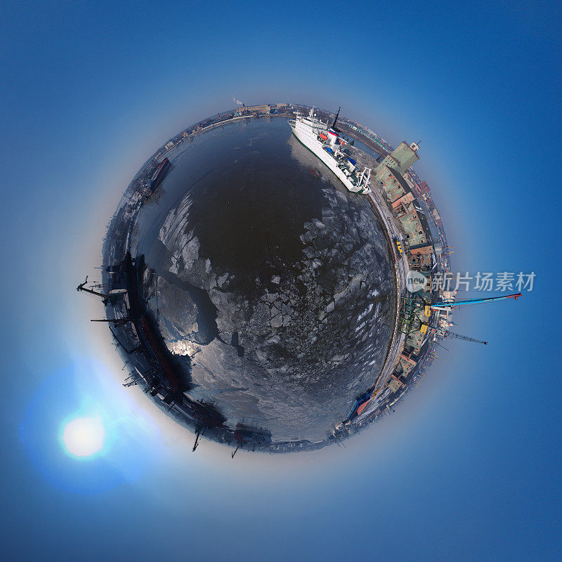 鸟瞰图上的商业码头在北港在冰冻的河流上的冬天