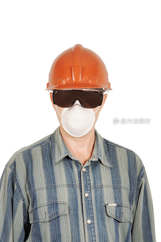 工人戴防护眼镜、头盔和呼吸器