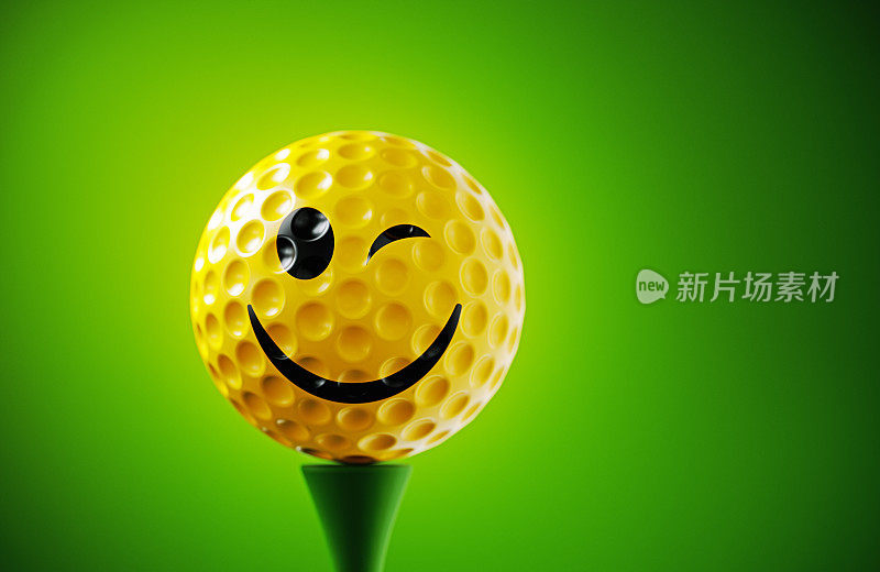 眨眼的脸印黄色高尔夫球在绿色的背景