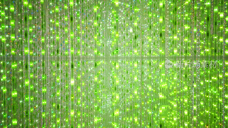 舞台背景绿色和红色的LED闪烁和闪烁的灯泡。
