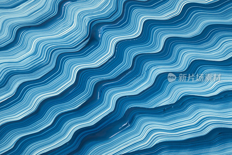 抽象流体液体蓝色丙烯酸涂料背景纹理