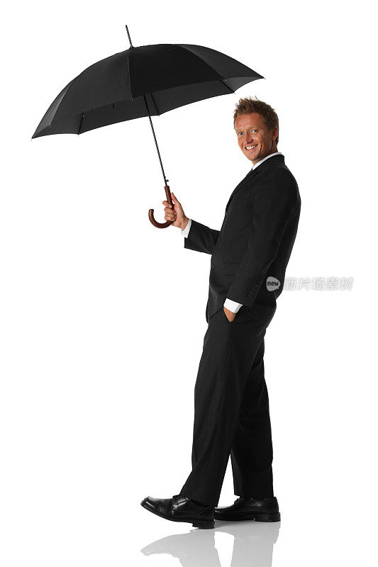 快乐的商人拿着一把伞