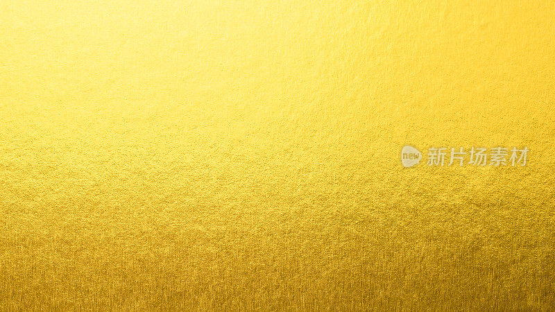 金色的背景箔叶金属金色的纹理光泽的包装纸亮黄色的壁纸设计装饰元素