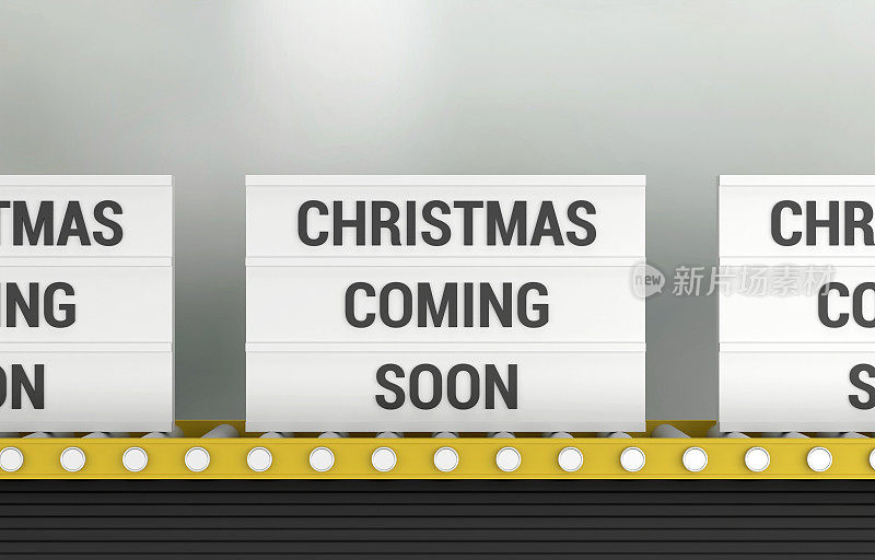 生产线上的灯箱上写着“圣诞节即将到来”