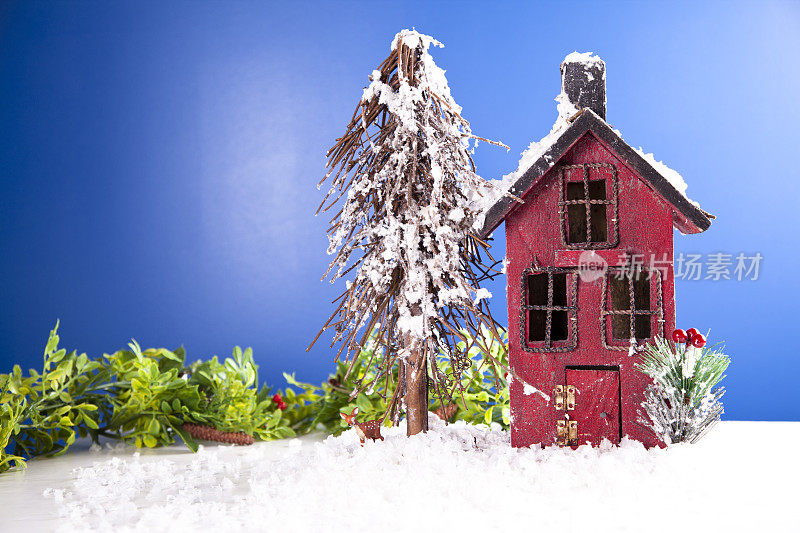 雪中的小木屋。