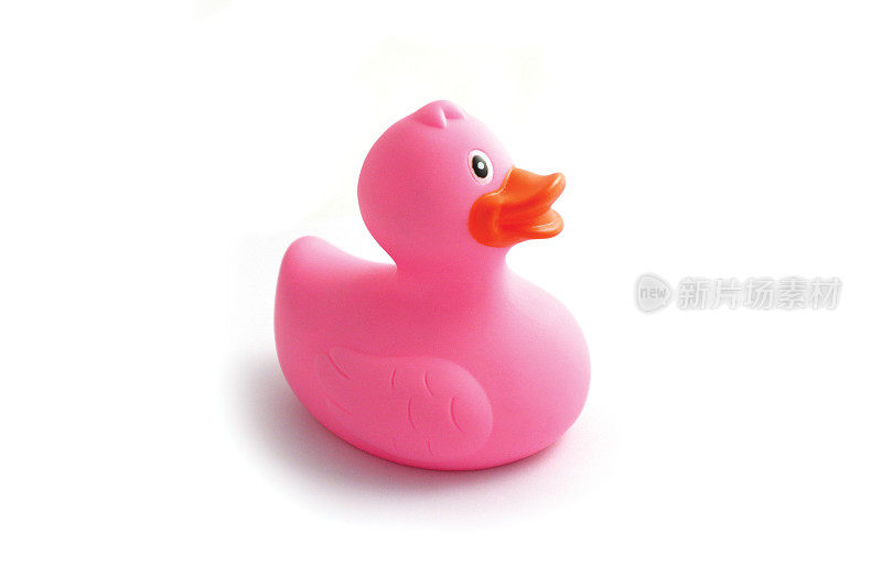 照片描绘的是一只粉红色的橡皮鸭，孤立在白色的背景上。