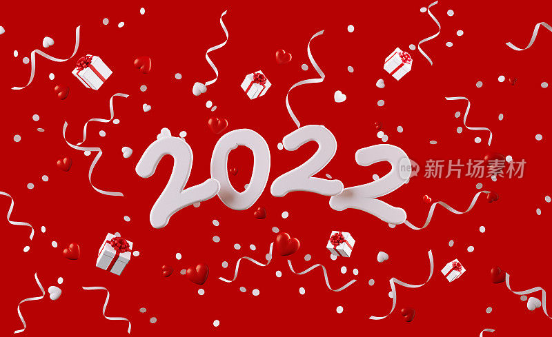 2022年，周围是礼品盒，五彩纸屑和派对彩带落在红色背景