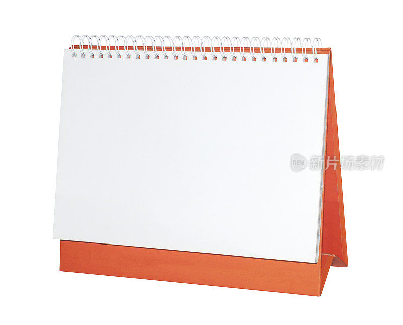 空白纸桌上螺旋日历。