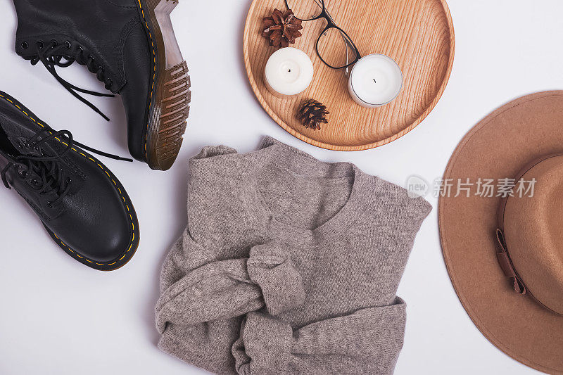 温暖舒适的毛衣，毡帽和靴子俯视图