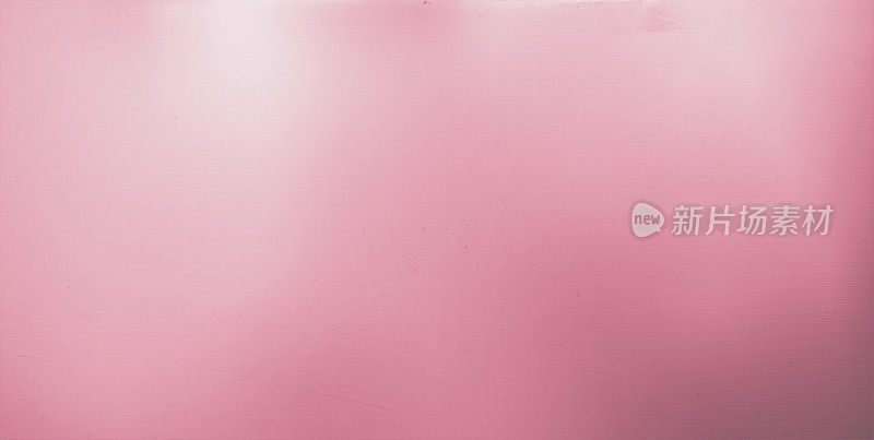 涂上粉红色油漆的钢板。背景