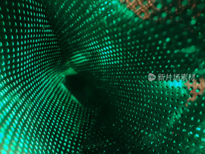 抽象的绿色漩涡纹线与点粒子照明波浪形背景。简约的现代封面设计。未来的几何图案。海报模板
