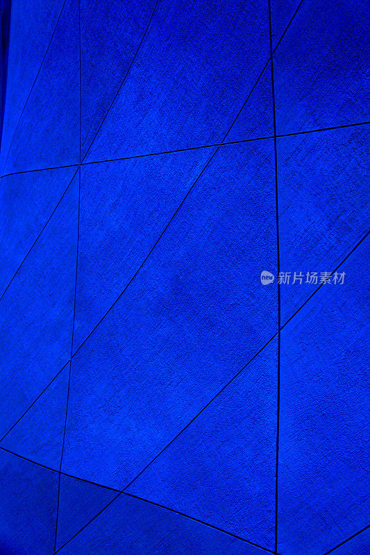 蓝色的混凝土块抽象的背景几何形状线条墙壁纹理