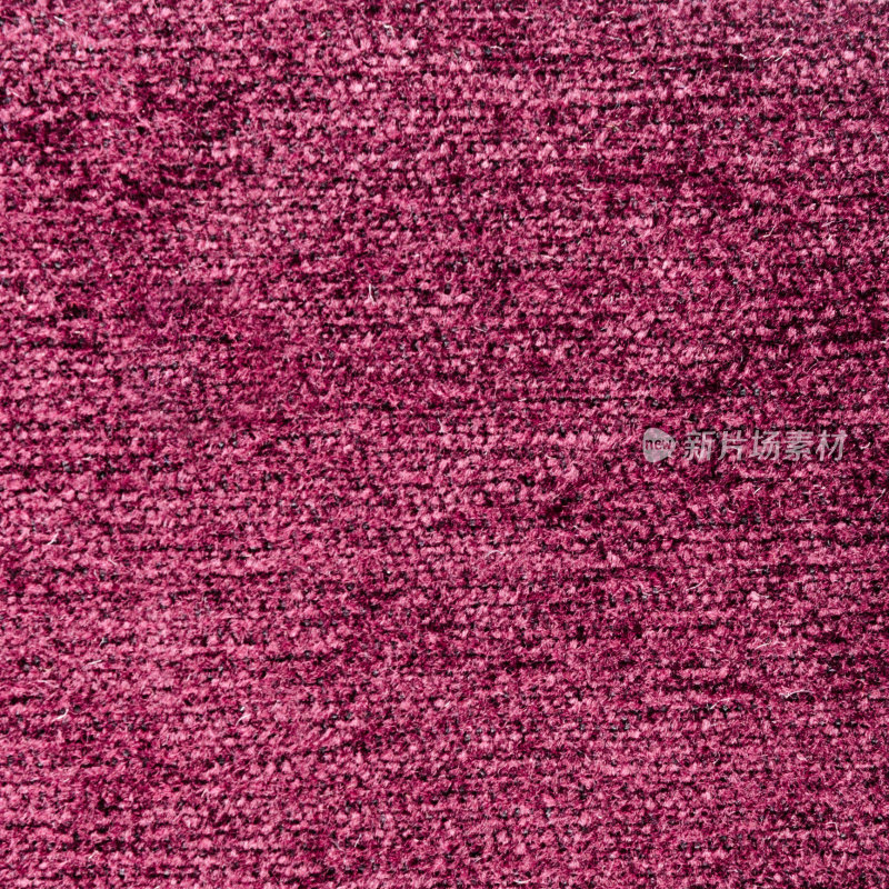 粗糙的充满活力的粉红色织物纹理背景