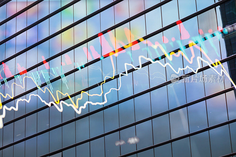 股票图表与玻璃办公楼图表