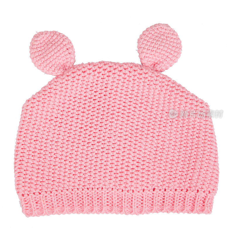 粉色针织冬季羊毛帽子与绒球绒球的婴儿