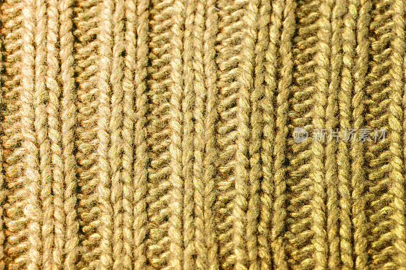 黄色罗纹或缆线针编织毛织背景