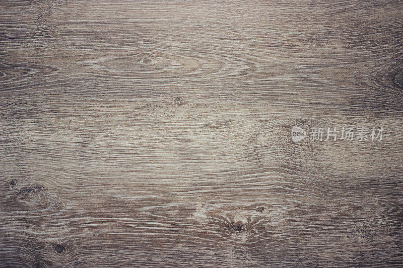 木质纹理配以天然木纹图案进行设计和装饰。深棕色木材背景。天然柚木背景。层压板拼花地板纹理背景。木质纹理设计。