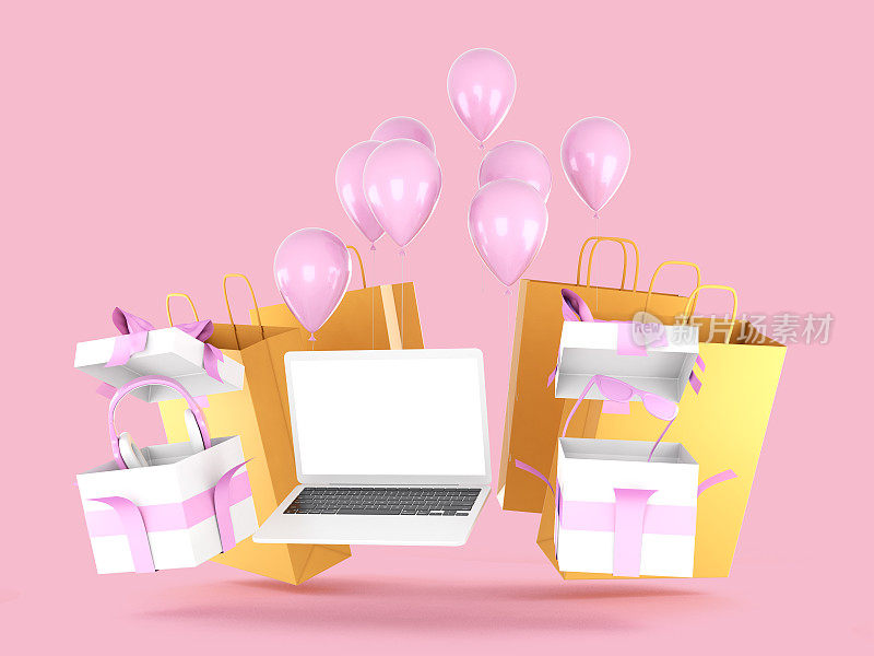 网上购物的概念。超薄笔记本电脑与购物和礼品项目的侧面。