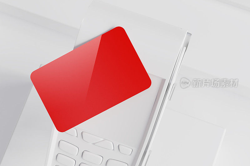 支付终端上方的红色空白塑料银行卡
