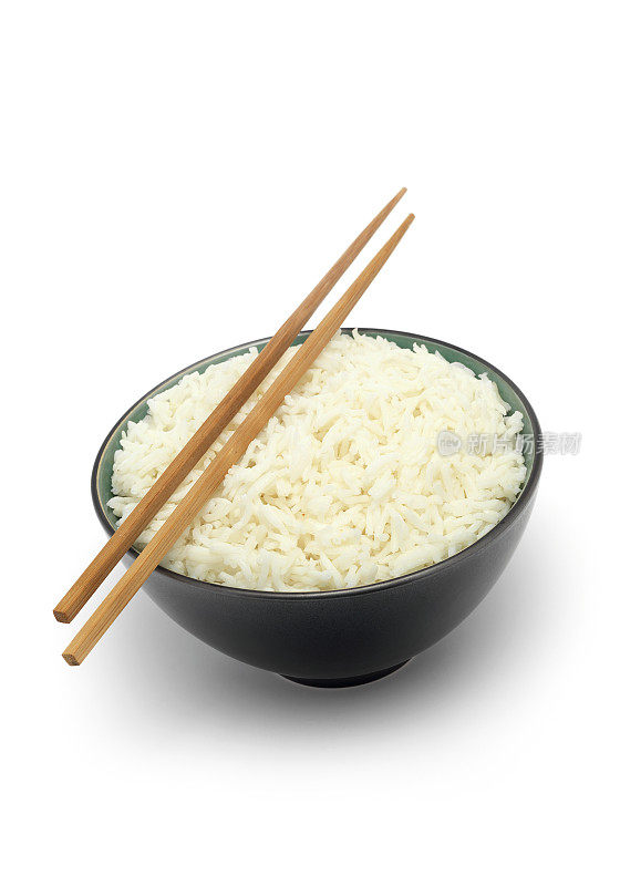 用筷子夹白米饭