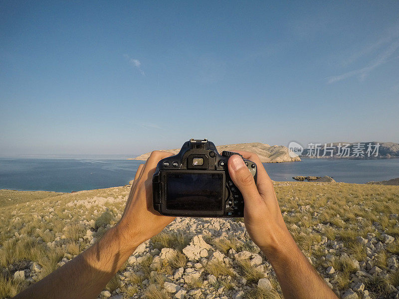 数码相机特写拍摄岛屿、海洋和景观(POV)