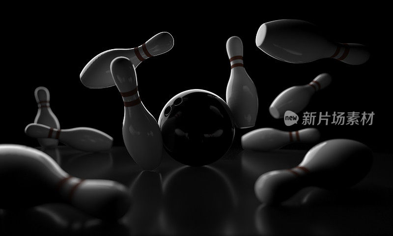保龄球击打概念:带瓶的黑球(浅景深，专注于球)