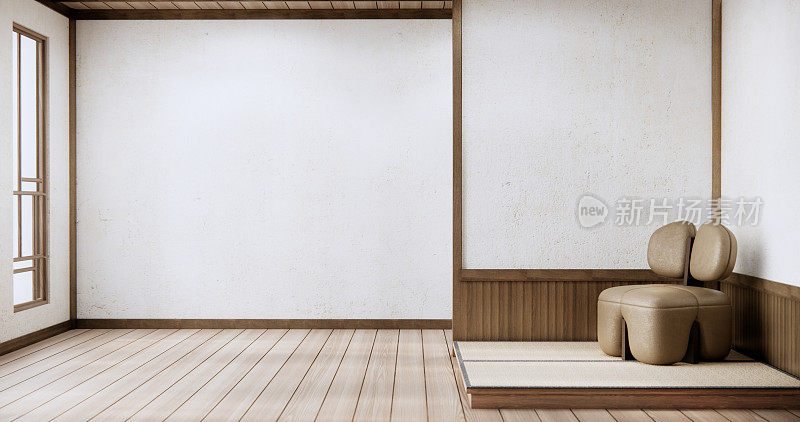 沙发扶手椅在日本客厅与空墙。