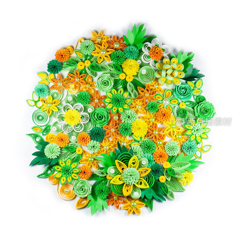 黄色，绿色，橙色和白色的纸刺花的特写