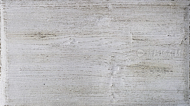 旧的一块白色风化的木板。