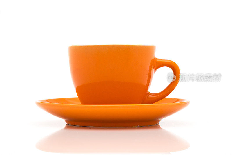 橙色的咖啡杯和咖啡碟