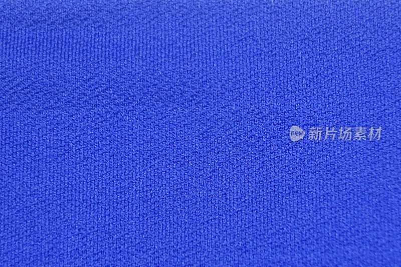 蓝色纺织经编织物背景