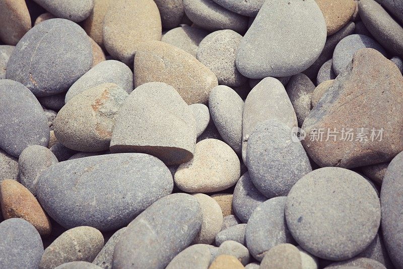 光滑的岩石海滩卵石完整的框架自然宁静的背景