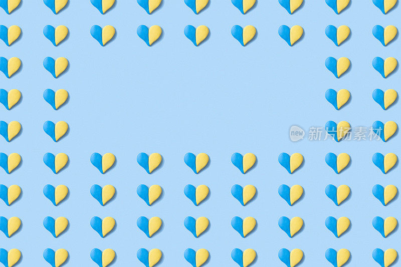 乌克兰国旗的黄蓝颜色与复制空间的许多心形图案