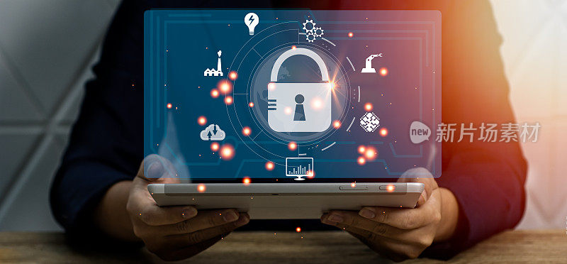 商人用平板电脑保护网络技术网络免受黑客的攻击。安全访问隐私元保护。