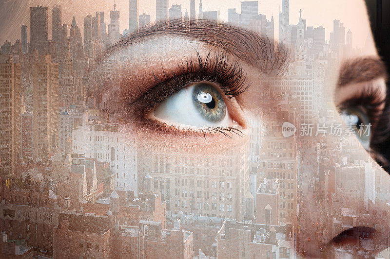女人的眼睛和商业城市的照片。双重曝光