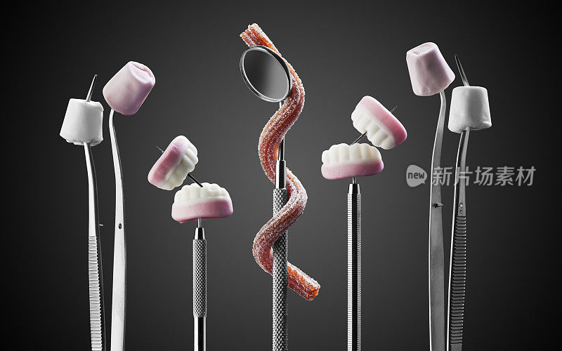糖果粘在牙医的器械和工具上