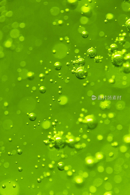 绿色碟肥皂泡沫气球极端微距离拍摄抽象背景