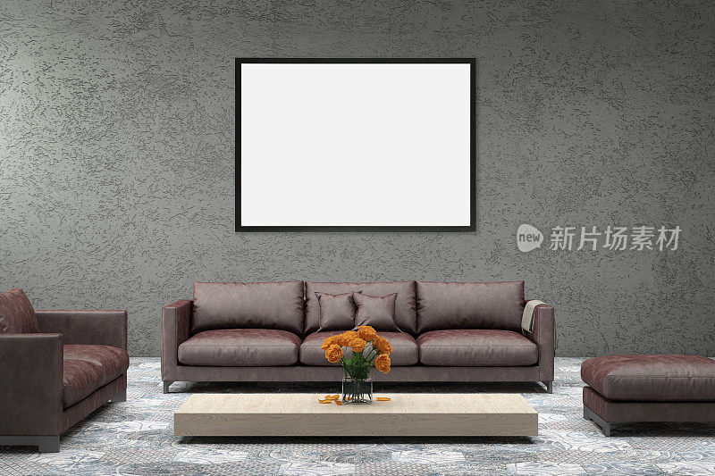 灰色墙壁上的空白相框，前面是沙发