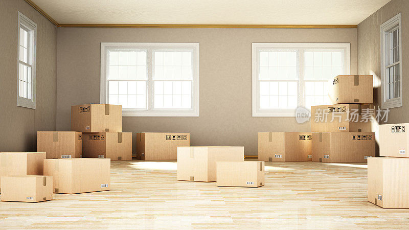 大房间里的硬纸盒散落在镶木地板上。交通和搬迁概念。