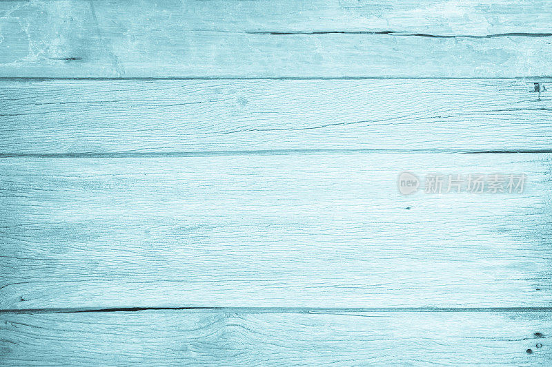 蓝色的木材背景在夏天。甜色木质纹理壁纸。油漆胶合板或硬木板。复古木旧墙有设计背景。油漆风化剥落的桌子木制品。