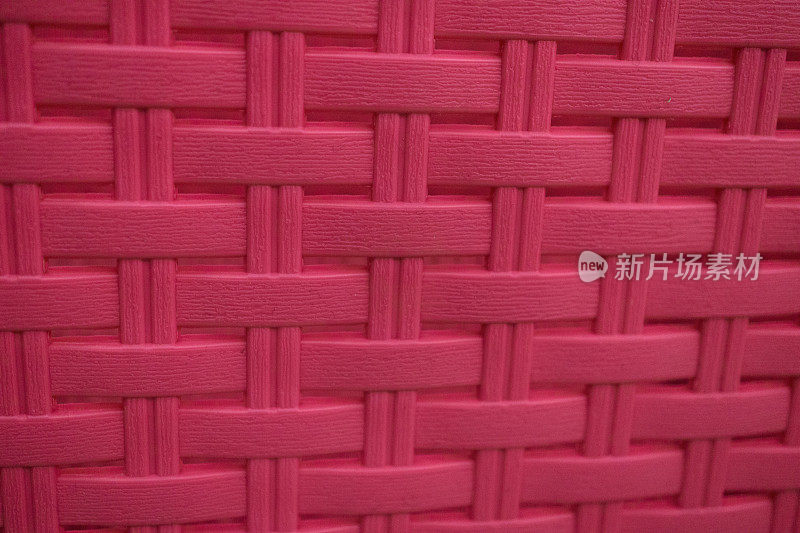 粉红色碳纤维编织背景