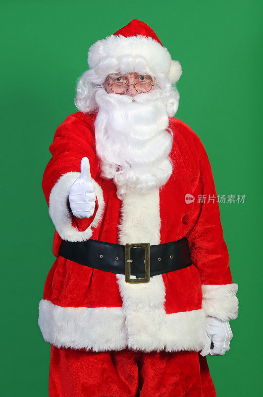 绿色屏幕上的圣诞老人竖起大拇指