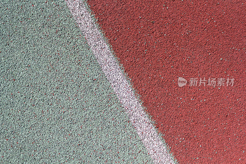 体育场跑步机的彩色橡胶涂层。背景和纹理
