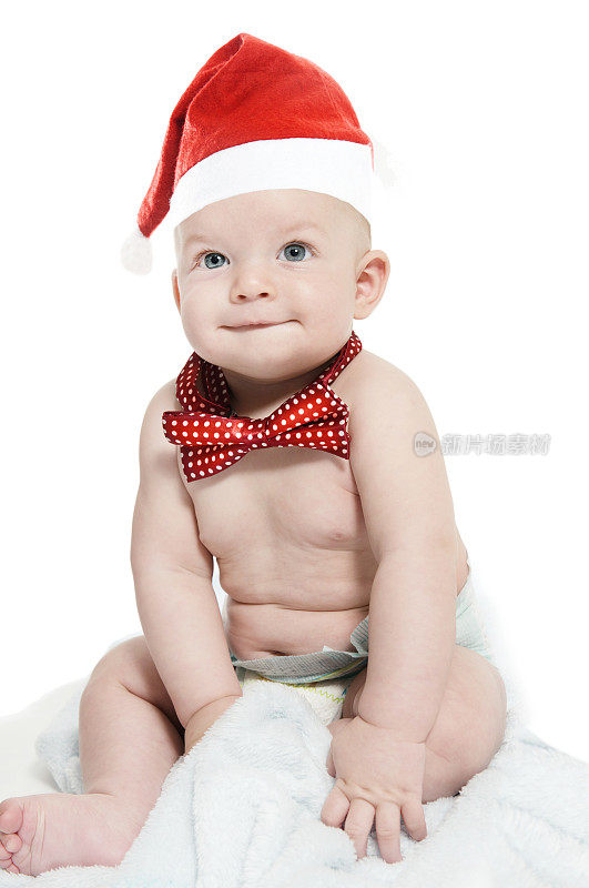 裸体婴儿微笑如何戴蝴蝶结和圣诞帽