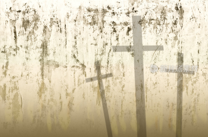 复活节。受难。三个十字架的阴影在垃圾背景。