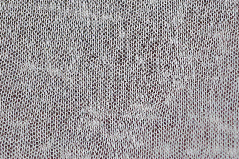 米色纺织经编织物背景
