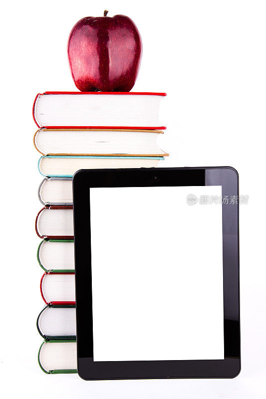 平板电脑书和苹果隔离在白色的背景