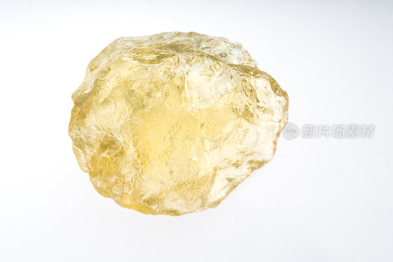 黄玉，白色背景的矿物石样